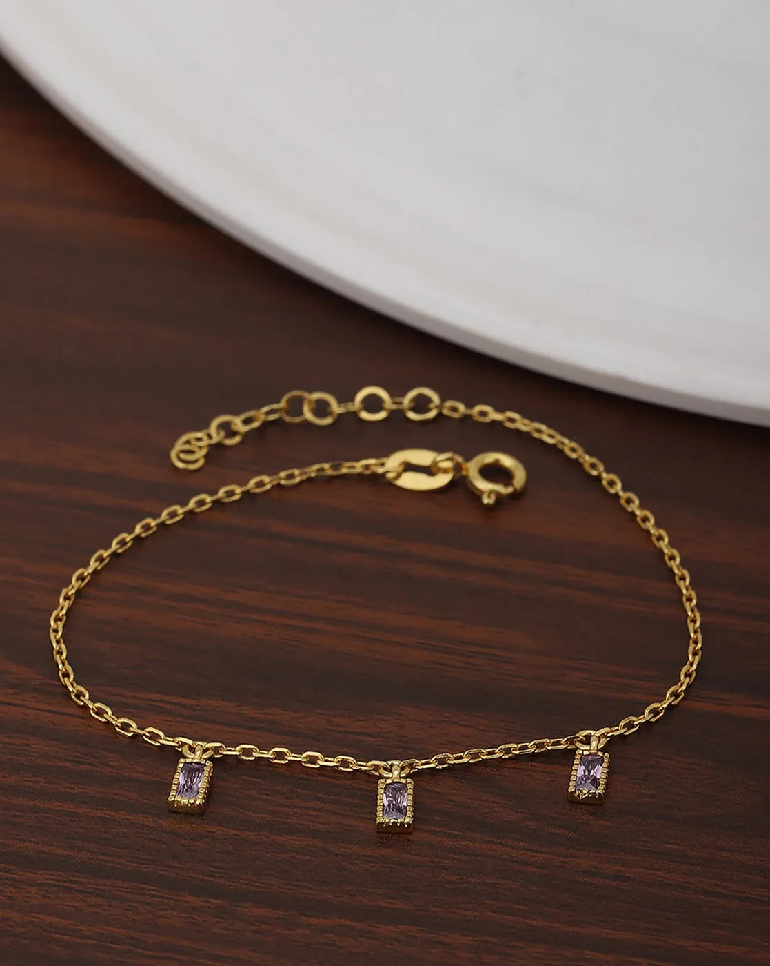 Carlton London Gold Plated Cz Studded Charm Bracelet For Women